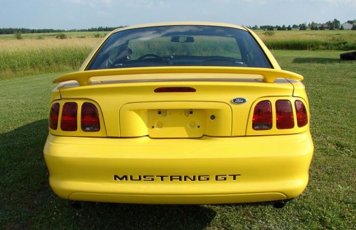 1998 Chrome Yellow Mustang GT coupe rear end view