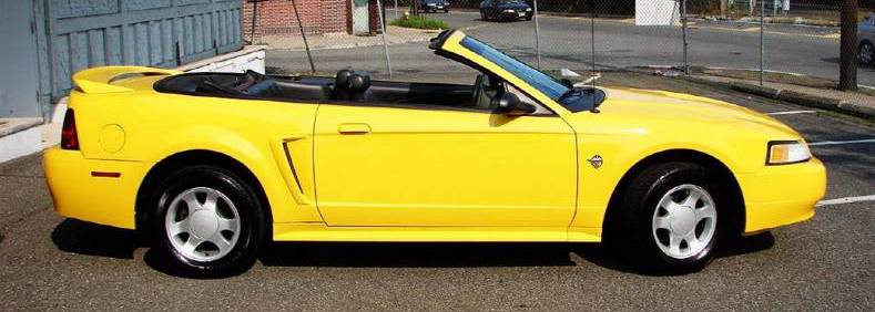 1999 Chrome Yellow Mustang Convertible right side