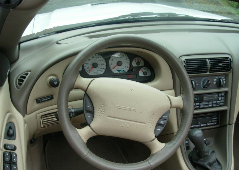 1999 Crystal White Cobra convertible dash