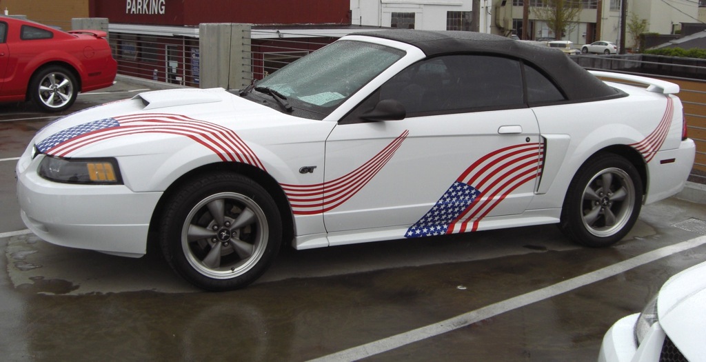 Oxford White 01 Mustang GT with red white blue flag graphics
